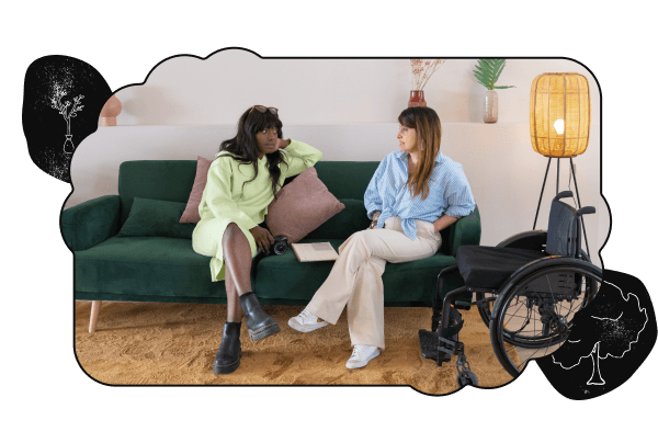 A picture of two people sitting and talking on a couch, cropped in a bubbly shape with a black border and tree sketches on the top-left and bottom-right corners.
